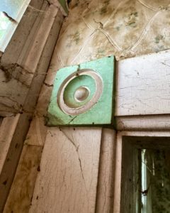 farmhouse woodwork green trim around doors