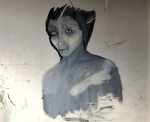 painting with shoe polish found in an abandoned building