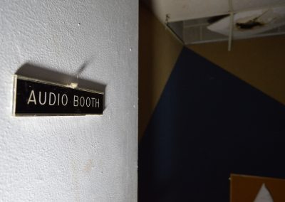 abandoned audio booth inside a news station