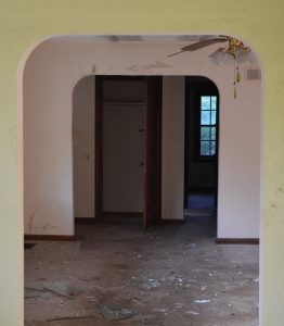 curved wide doorways in abandoned country home in rural ohio