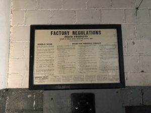 delco factory regulation sign inside mendelsons
