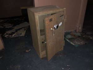 abandoned safe left open rusted