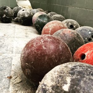 close up of abandoned bowling balls