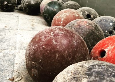 close up of abandoned bowling balls