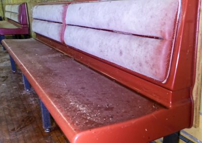 abandoned skating rink red benches
