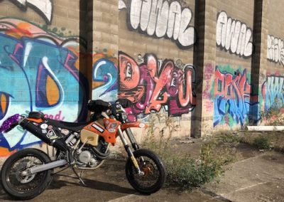 ktm supermoto against graffiti wall