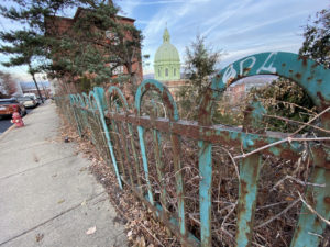 abandoned catholic school fence