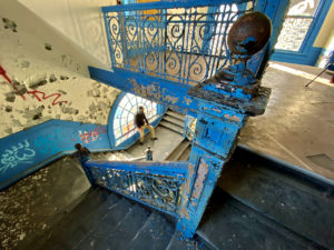 abandoned school blue staircase