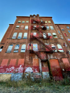 abandoned school red fire escape