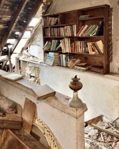 abandoned-dusty-book-shelf