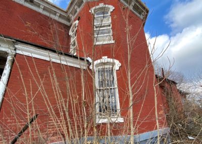 victorian style house abandoned side windows