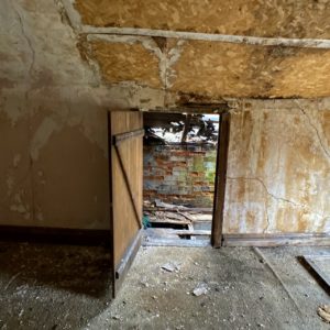 victorian style house abandoned attic door open