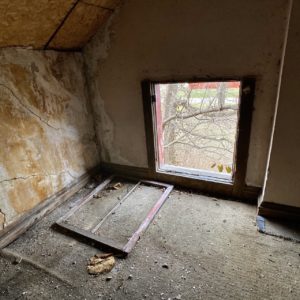 victorian style house abandoned attic window