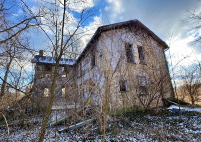 abandoned farmhouse rear