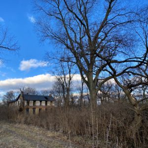 abandoned colonial farmhouse angle