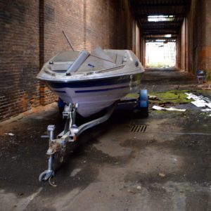 abandoned-boat-in-storage