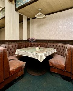 round-corner-booth-at-abandoned-chinese-food-restaurant