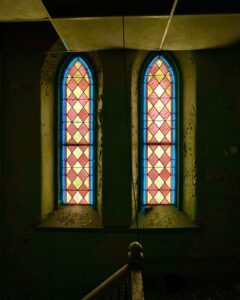 abandoned-church-two-stained-glass-windows