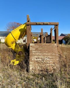 abandoned-school-wood-playground-slide