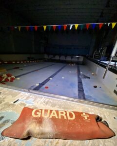 abandoned-pool-with-lifeguard-float