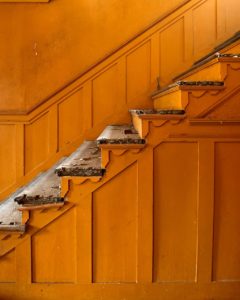 orange staircase in a colonial house