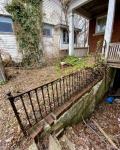 colonial house rot iron fence