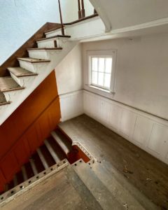 white and orange stairwell