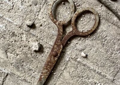 rusty-scissors-on-floor-sewing