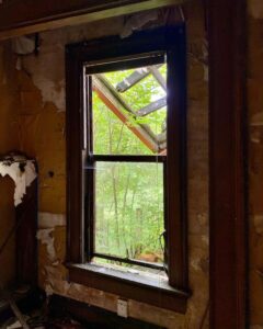 abandoned-house-victorian-window-looking-out