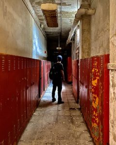 abandoned school hallway red lockers