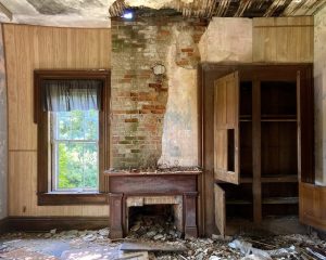 abandoned victorian mansion fire place