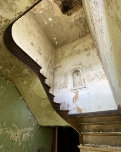 abandoned victorian mansion staircase