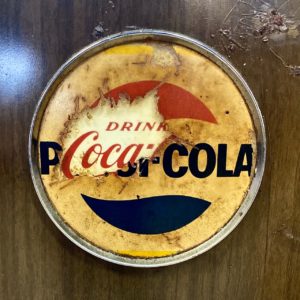 vintage drink cooler coca cola covered by pepsi