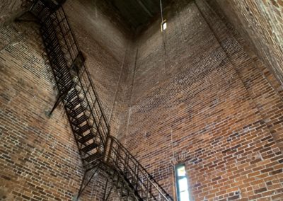 looking up inside huge abandoned tower