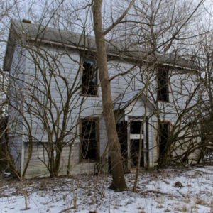 abandoned farmhouse front