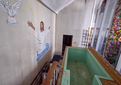 full immersion baptism church with dove mural