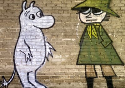 graffiti-white-dog-green-person