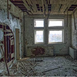 abandoned room with windows plaster