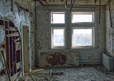 abandoned room with windows plaster