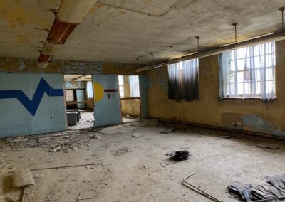 blue painted abandoned classroom