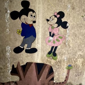 minnie and micky mouse vintage painting in abandoned school