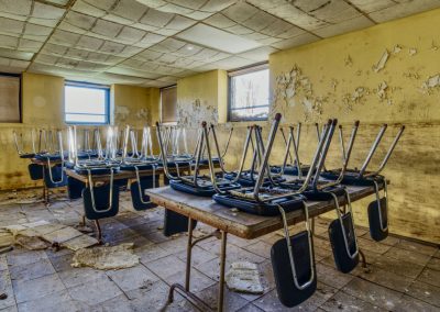 abandoned-school-cafeteria-chairs