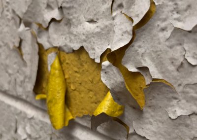 white-wall-yellow-flaking-paint