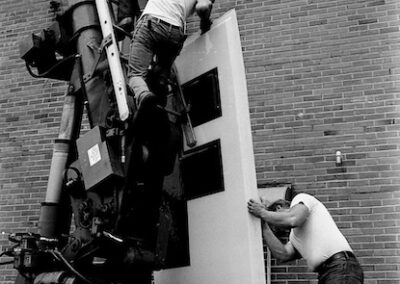 fairborn-theater-sign-installation-men-working-ladders