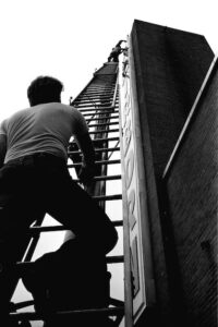 looking-up-a-ladder-1940s-construction-site